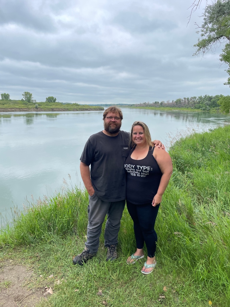 Kelli and husband by the Missouri River